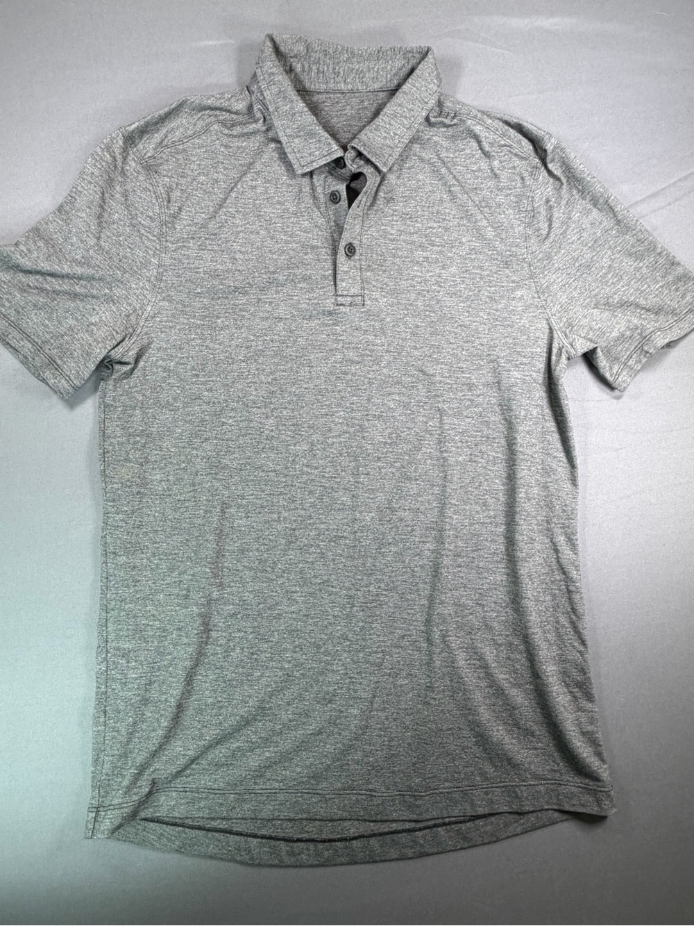 Men’s Lululemon Evolution Performance golf polo shirt.